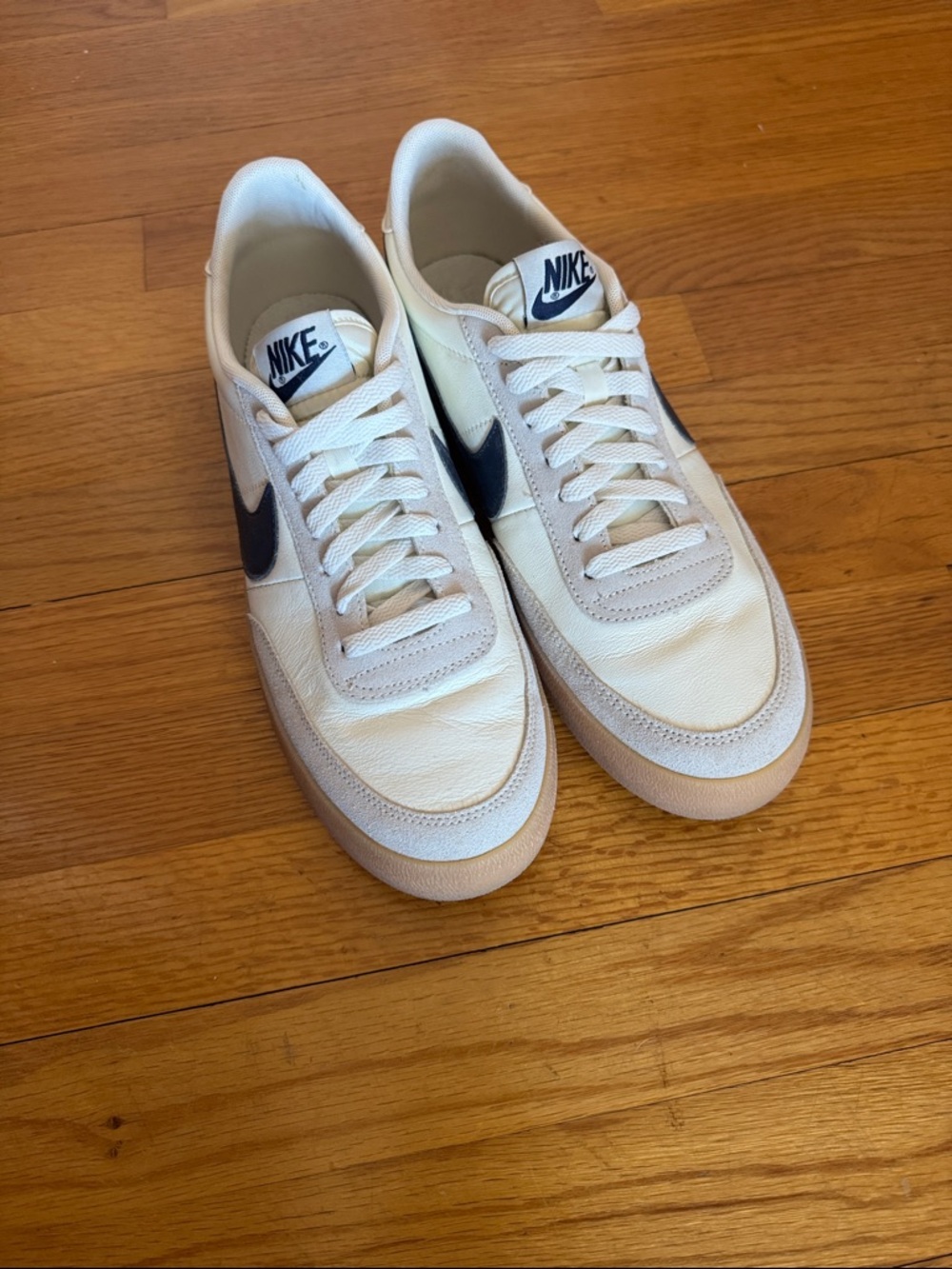 Nike Men’s Low-Top Sneakers in White with Navy Swoosh